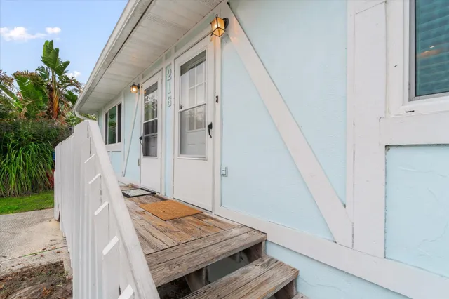 a view of a hallway with seating space