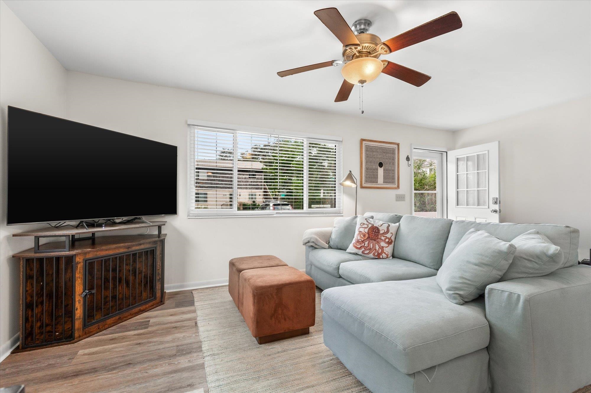 216 9th Street St. Augustine, FL 32080 - Photo 4 of 35 a living room with furniture and a flat screen tv