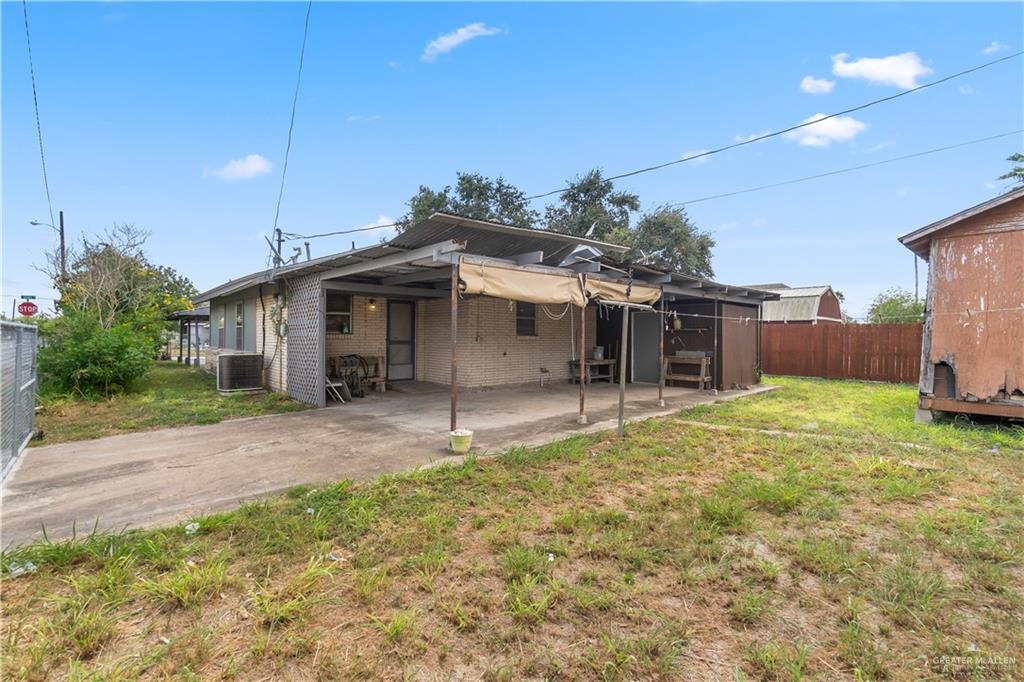 202 North Ester Street Edcouch, TX 78538 - Photo 13 of 13 a view of a house with backyard and a tree