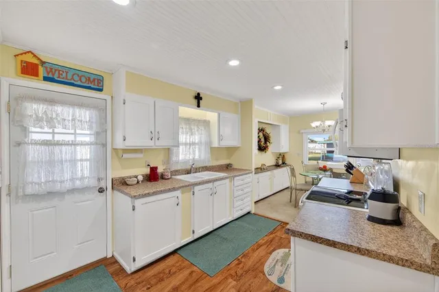 a bedroom that has a bed and a table in it