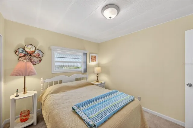 a view of a chairs and table in patio