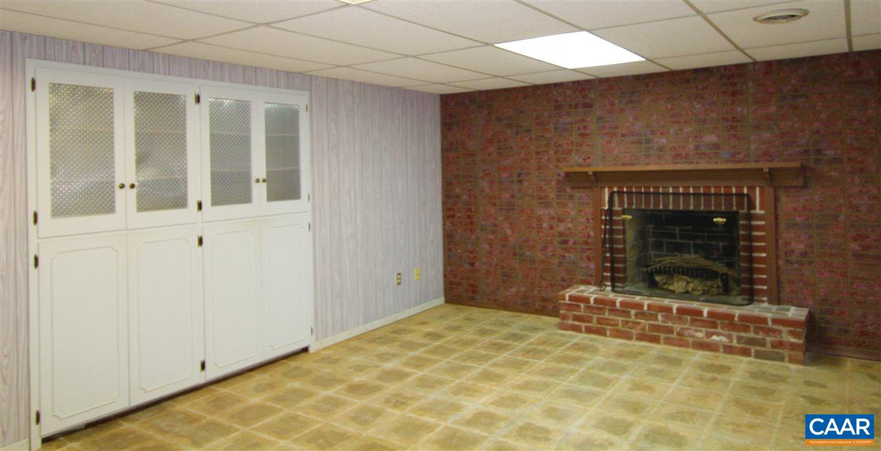 803 Woodlands Road Charlottesville, VA 22901 - Photo 14 of 15 a view of a fireplace with wooden floor