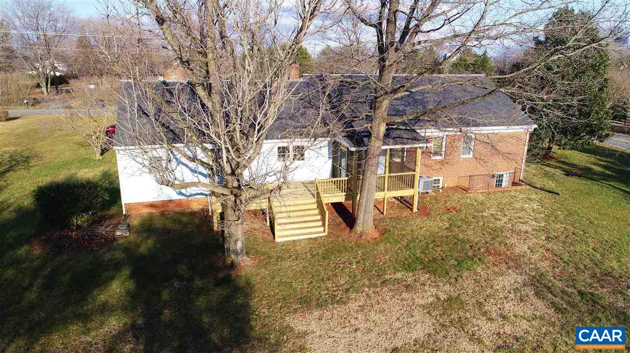 803 Woodlands Road Charlottesville, VA 22901 - Photo 5 of 15 a view of a house with a yard