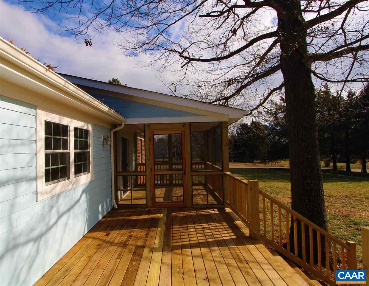 803 Woodlands Road Charlottesville, VA 22901 - Photo 8 of 15 a view of a house with wooden floor next to a yard