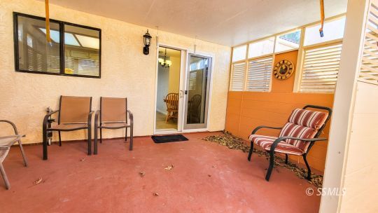 328 Del Mar Lane Ridgecrest, CA 93555 - Photo 10 of 12 a view of a livingroom with furniture and a window