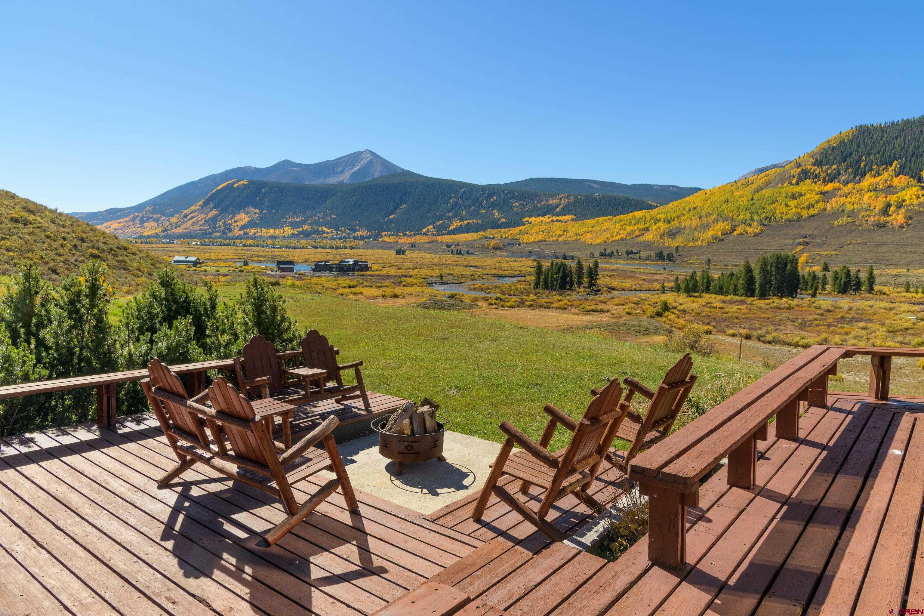 1250 County Road 734 Crested Butte, CO 81224 - Photo 2 of 45 a view of a balcony with an ocean