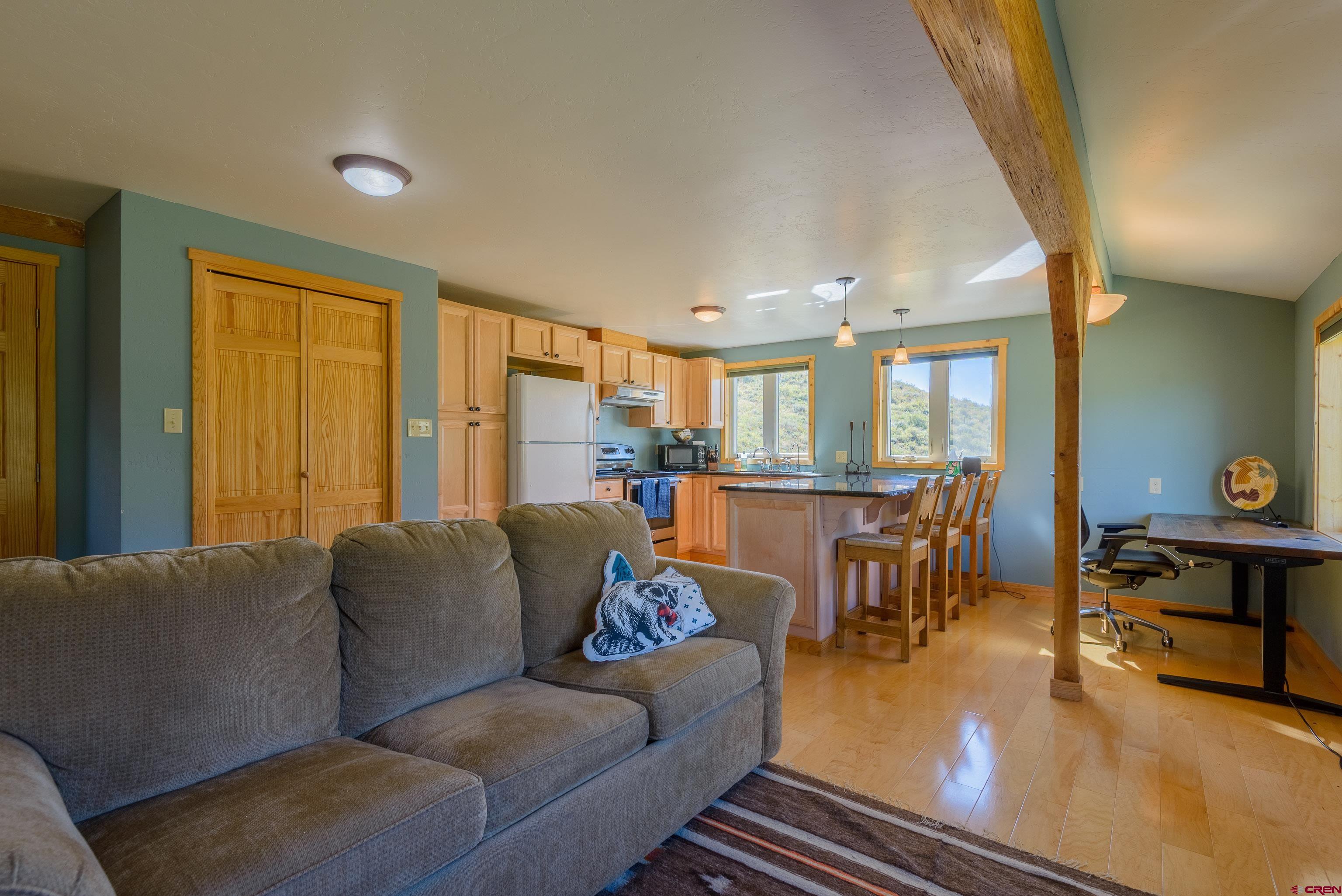 1250 County Road 734 Crested Butte, CO 81224 - Photo 38 of 45 a living room with furniture and a table