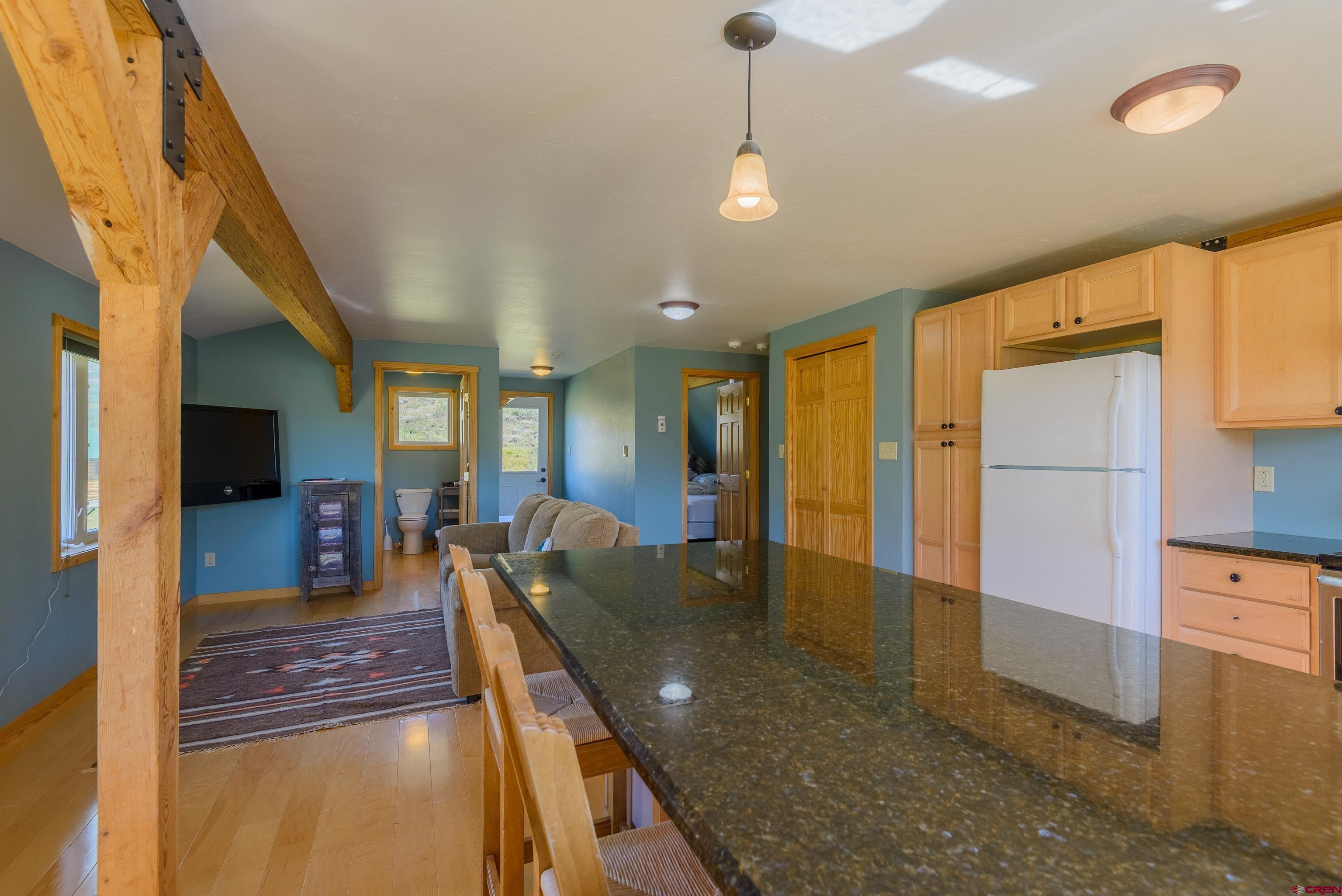 1250 County Road 734 Crested Butte, CO 81224 - Photo 41 of 45 a view of a living room and dining room
