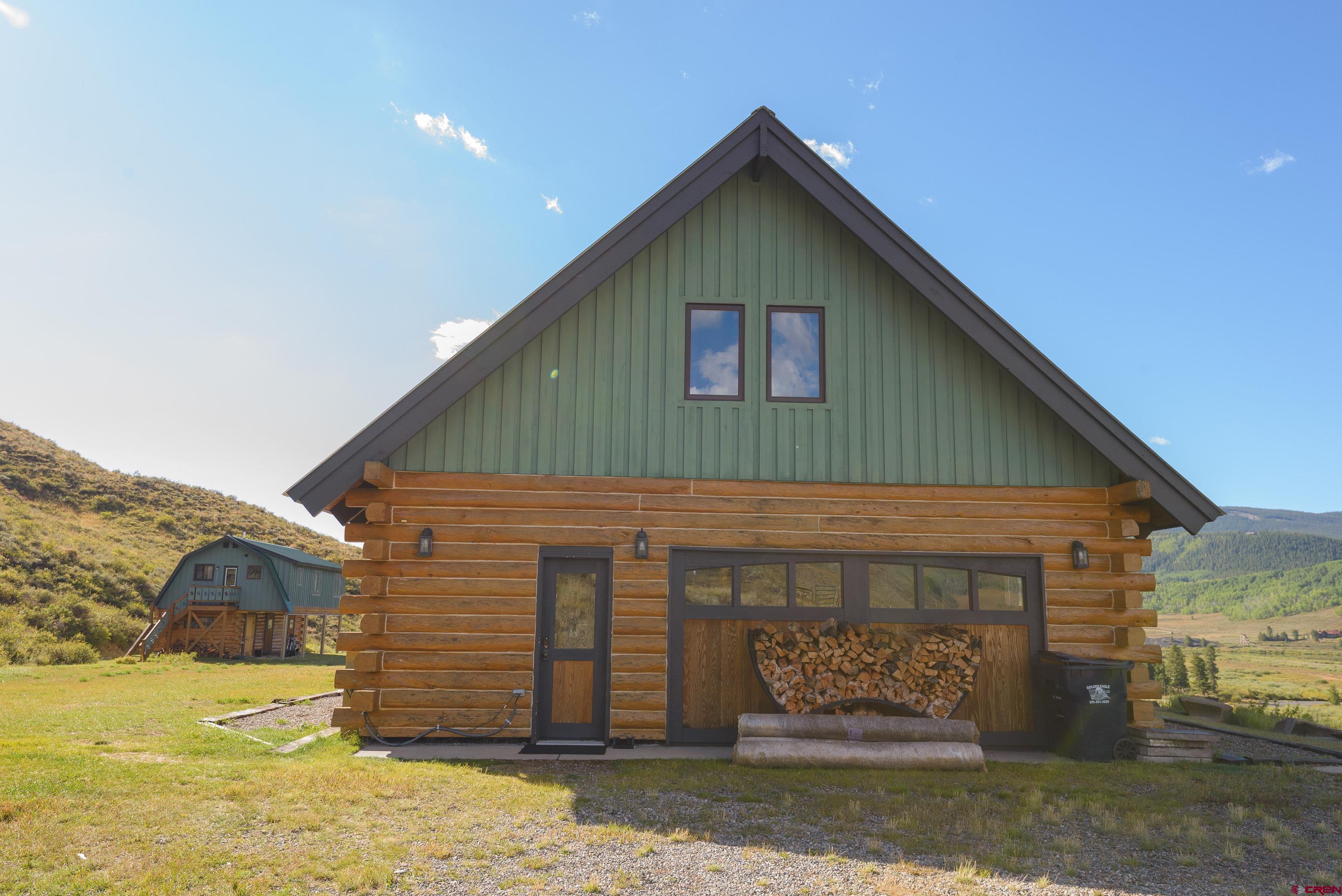 1250 County Road 734 Crested Butte, CO 81224 - Photo 45 of 45 a front view of a house with a yard
