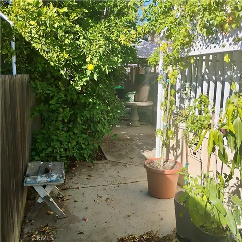 a view of a backyard with plants