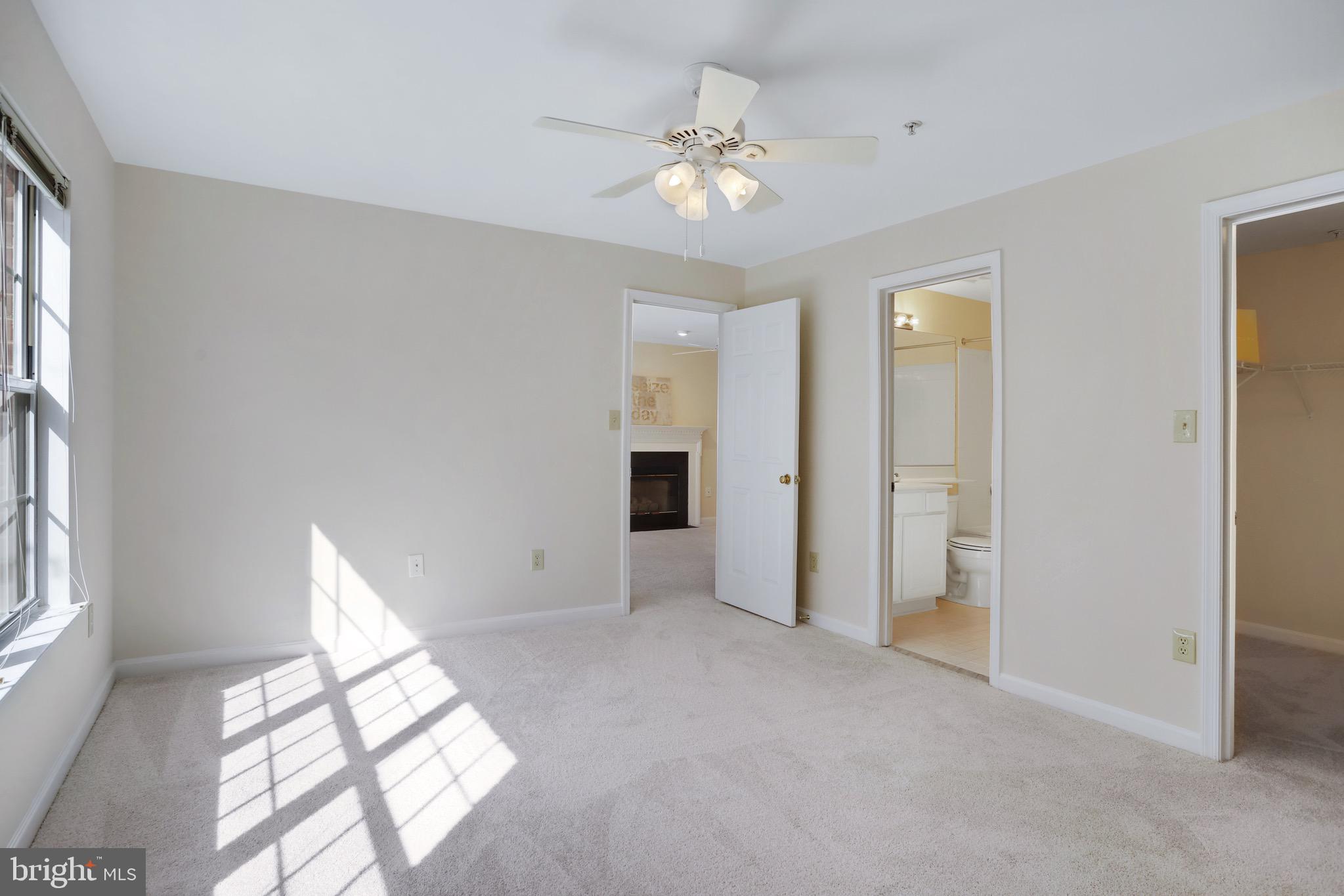 111 Timberbrook Lane, Unit 201 Gaithersburg, MD 20878 - Photo 23 of 38 a view of an empty room with a window