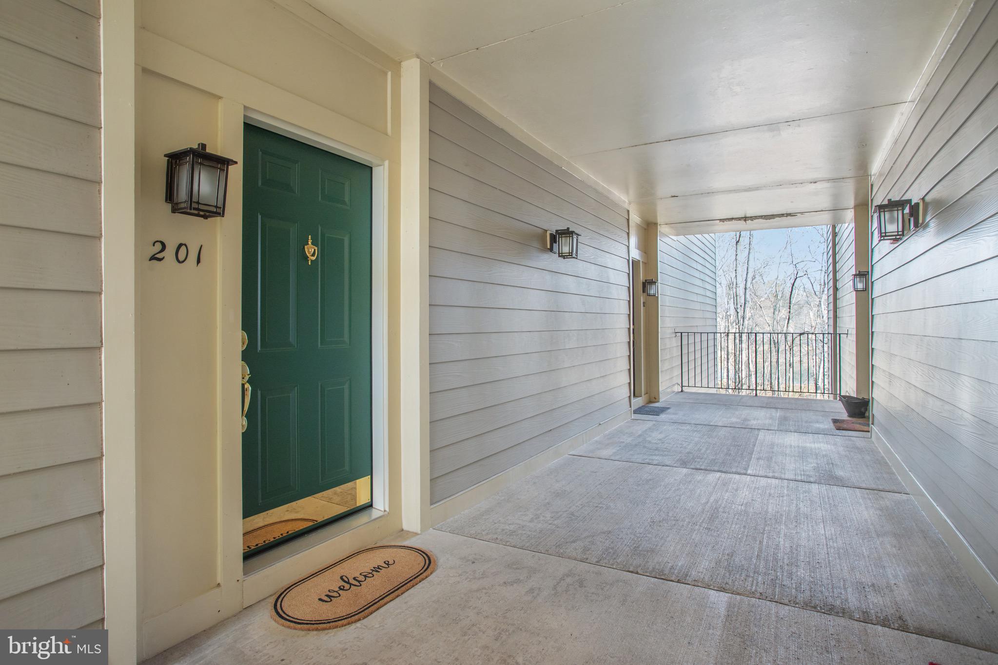 111 Timberbrook Lane, Unit 201 Gaithersburg, MD 20878 - Photo 4 of 38 a view of a door