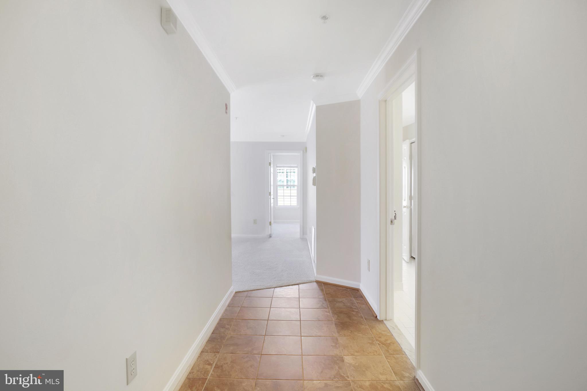 111 Timberbrook Lane, Unit 201 Gaithersburg, MD 20878 - Photo 5 of 38 a view of an empty room
