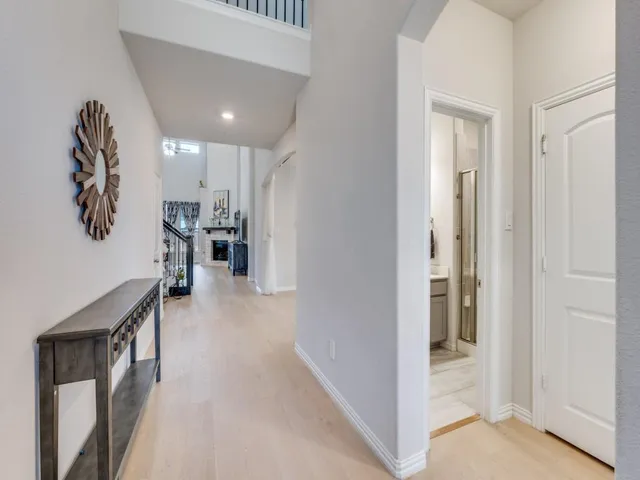 a view of a hallway with a furniture