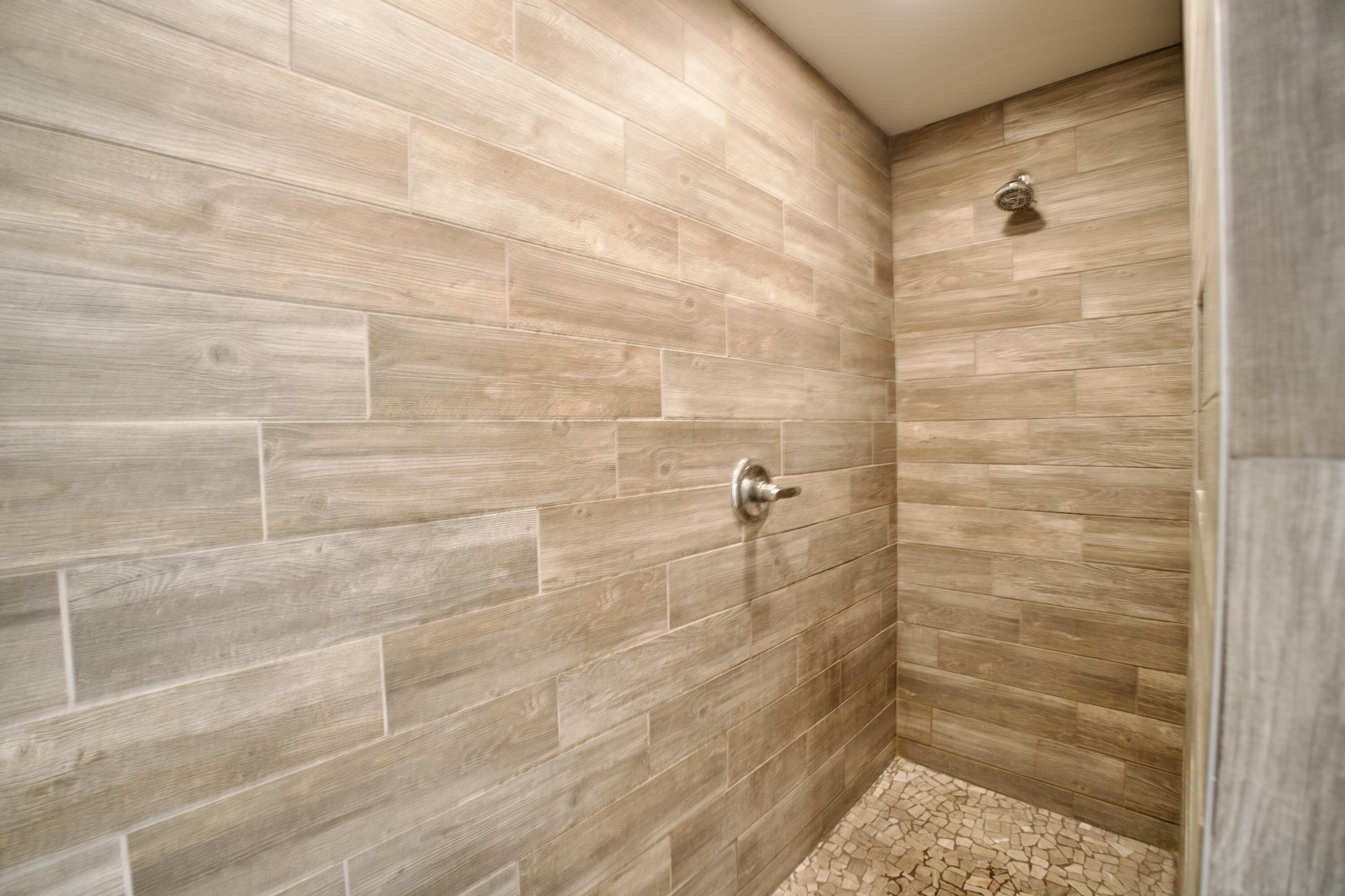 8813 17th Street Lubbock, TX 79416 - Photo 15 of 20 a bathroom with a shower