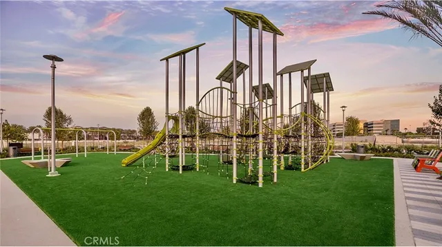 a view of a park with a slide