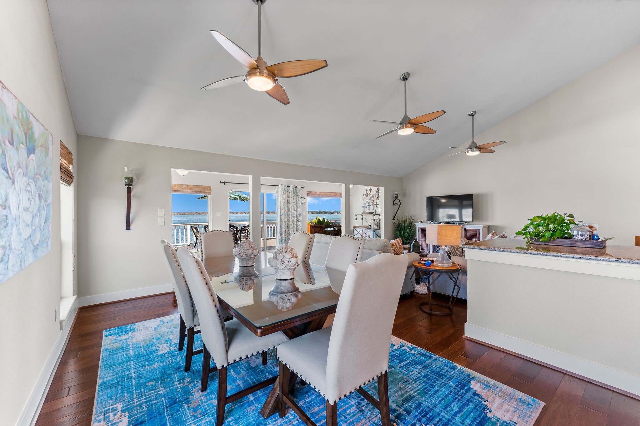 69 Lakeview Village Conroe, TX 77356 - Photo 16 of 50 a view of a dining room with furniture window and wooden floor