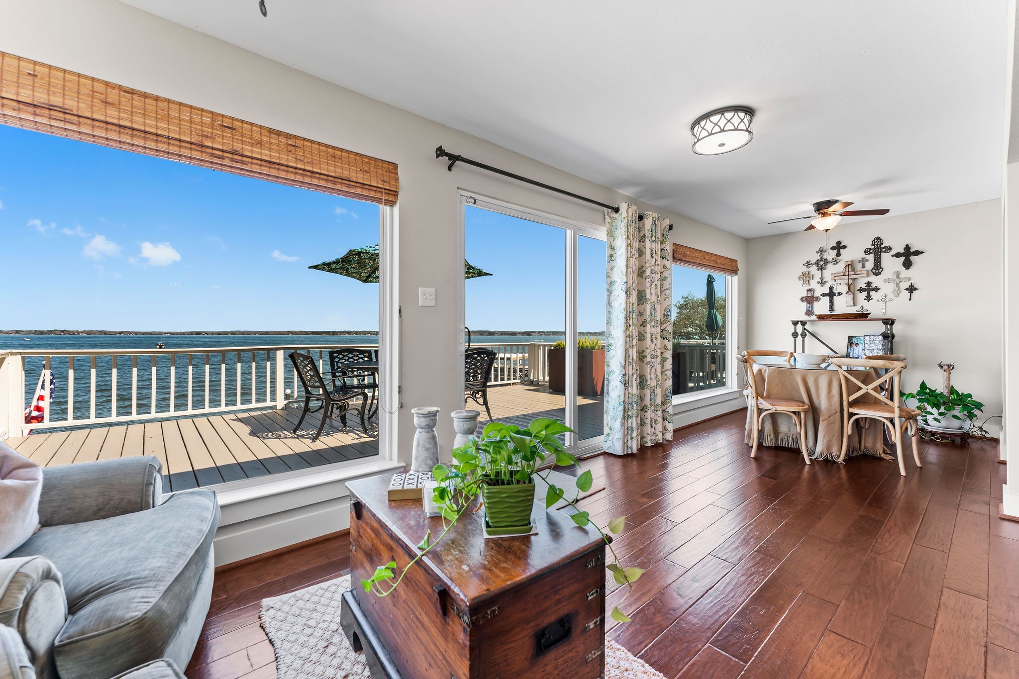 69 Lakeview Village Conroe, TX 77356 - Photo 17 of 50 a living room with furniture and a wooden floor