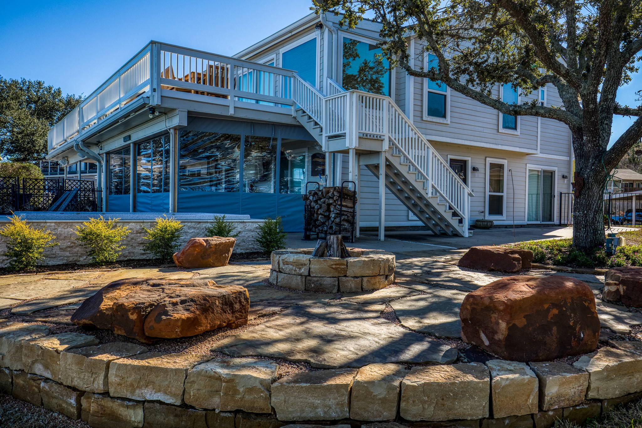 69 Lakeview Village Conroe, TX 77356 - Photo 3 of 50 a view of a house with backyard and sitting area