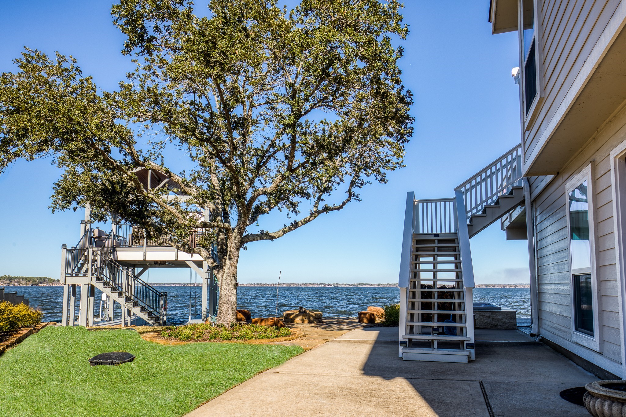 69 Lakeview Village Conroe, TX 77356 - Photo 33 of 50 a view of outdoor space yard and patio