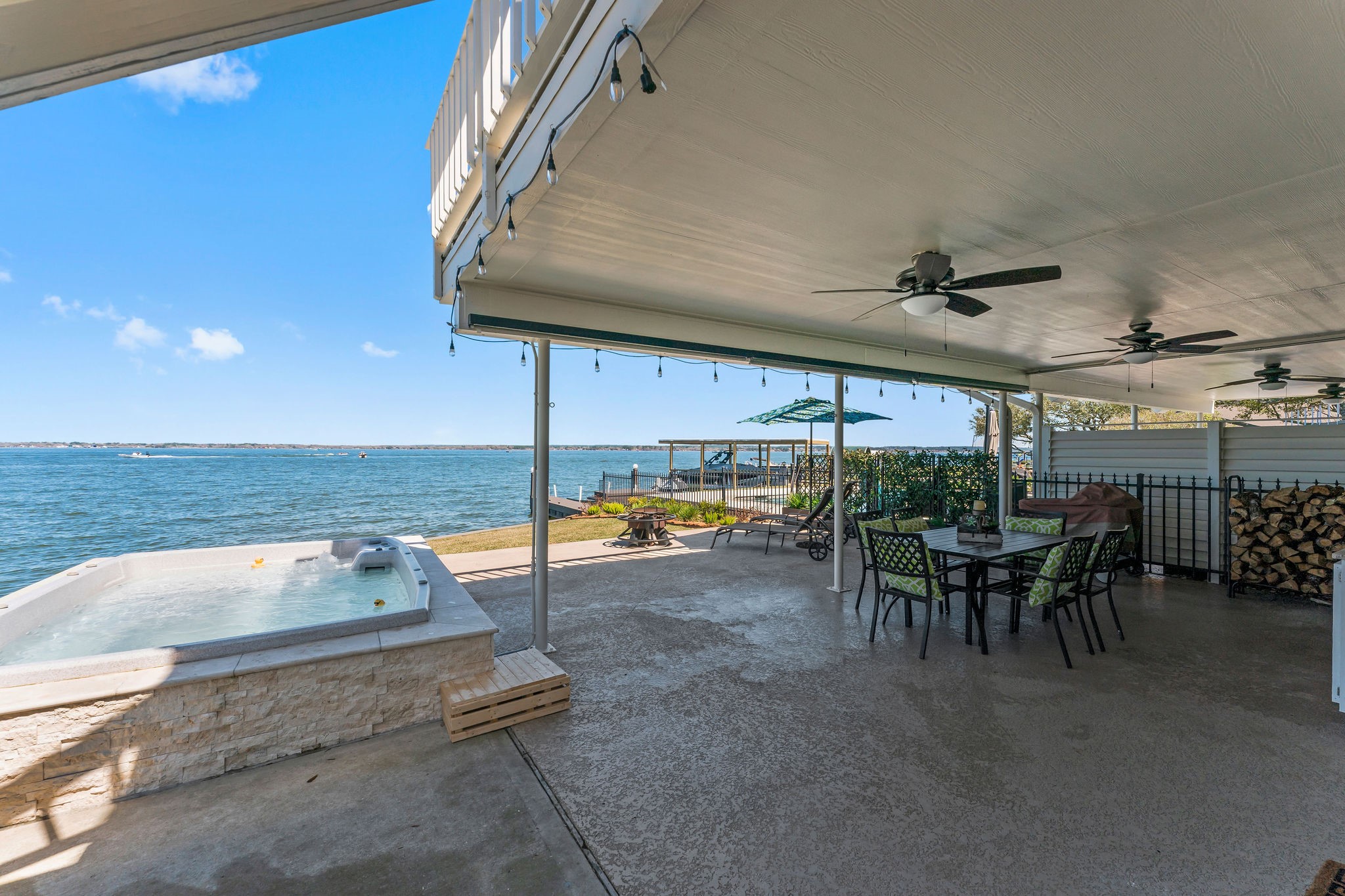 69 Lakeview Village Conroe, TX 77356 - Photo 34 of 50 a view of a swimming pool and outdoor seating