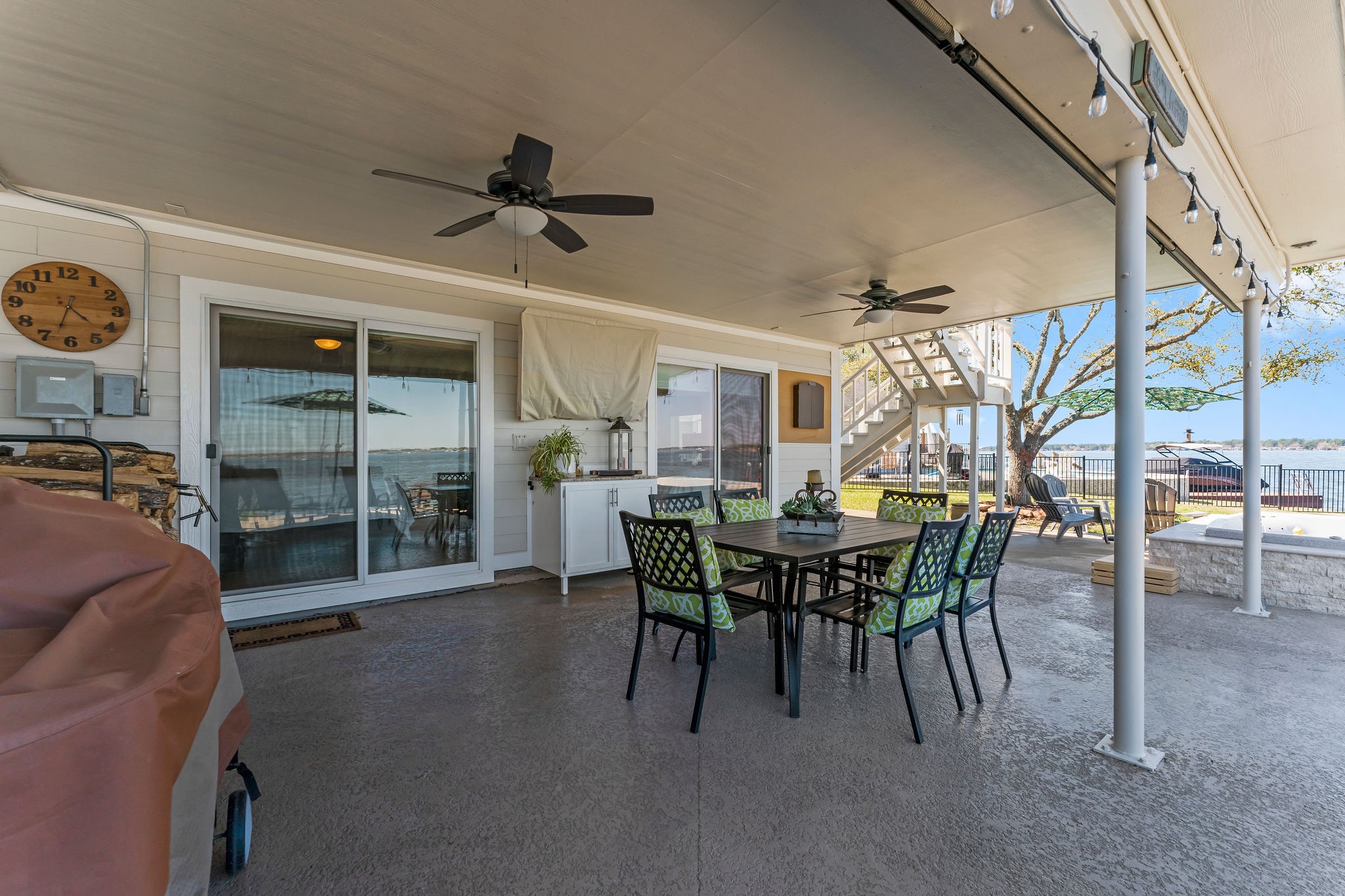 69 Lakeview Village Conroe, TX 77356 - Photo 35 of 50 a view of a dining room with furniture and chandelier