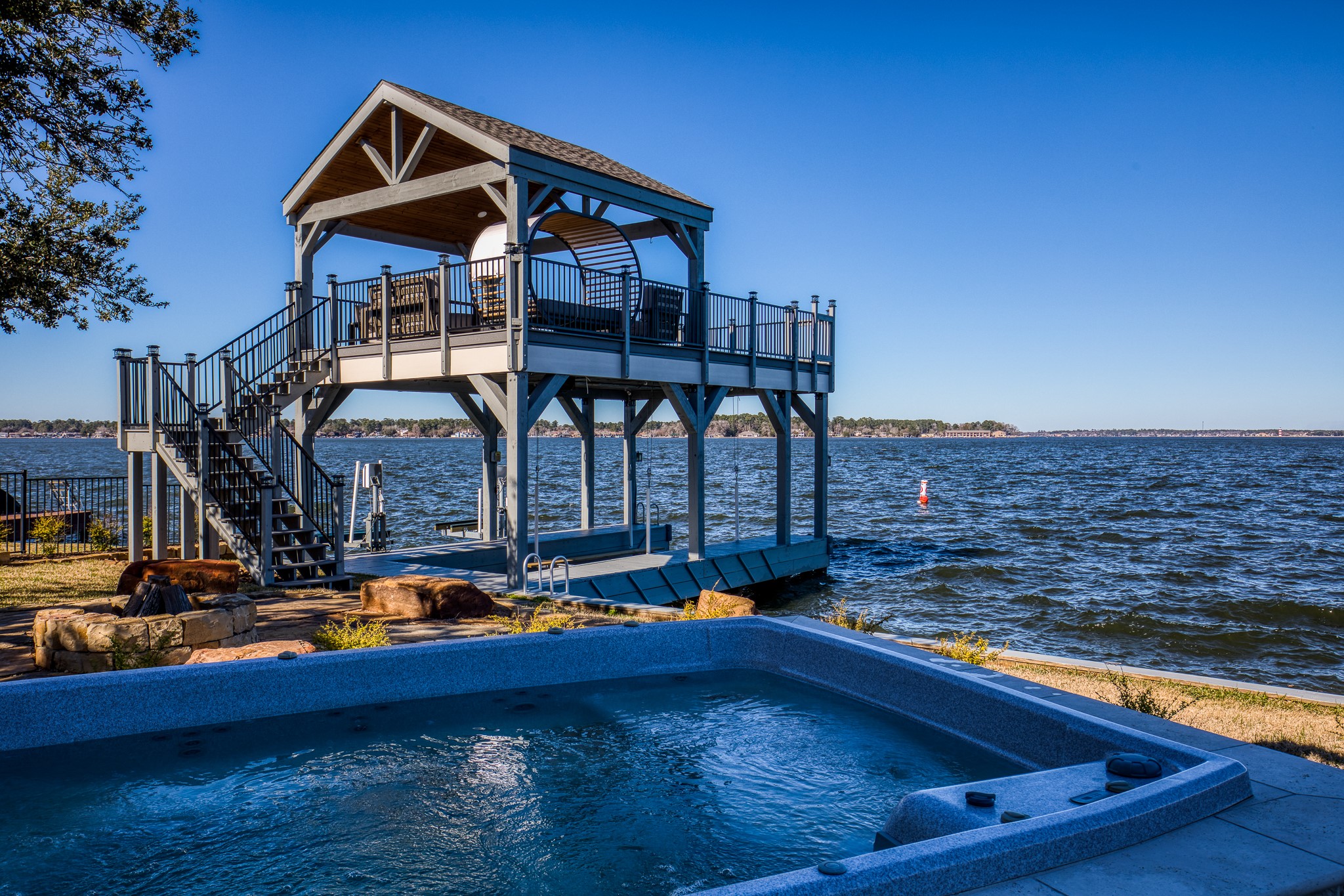 69 Lakeview Village Conroe, TX 77356 - Photo 37 of 50 a view of a house with pool and sitting area