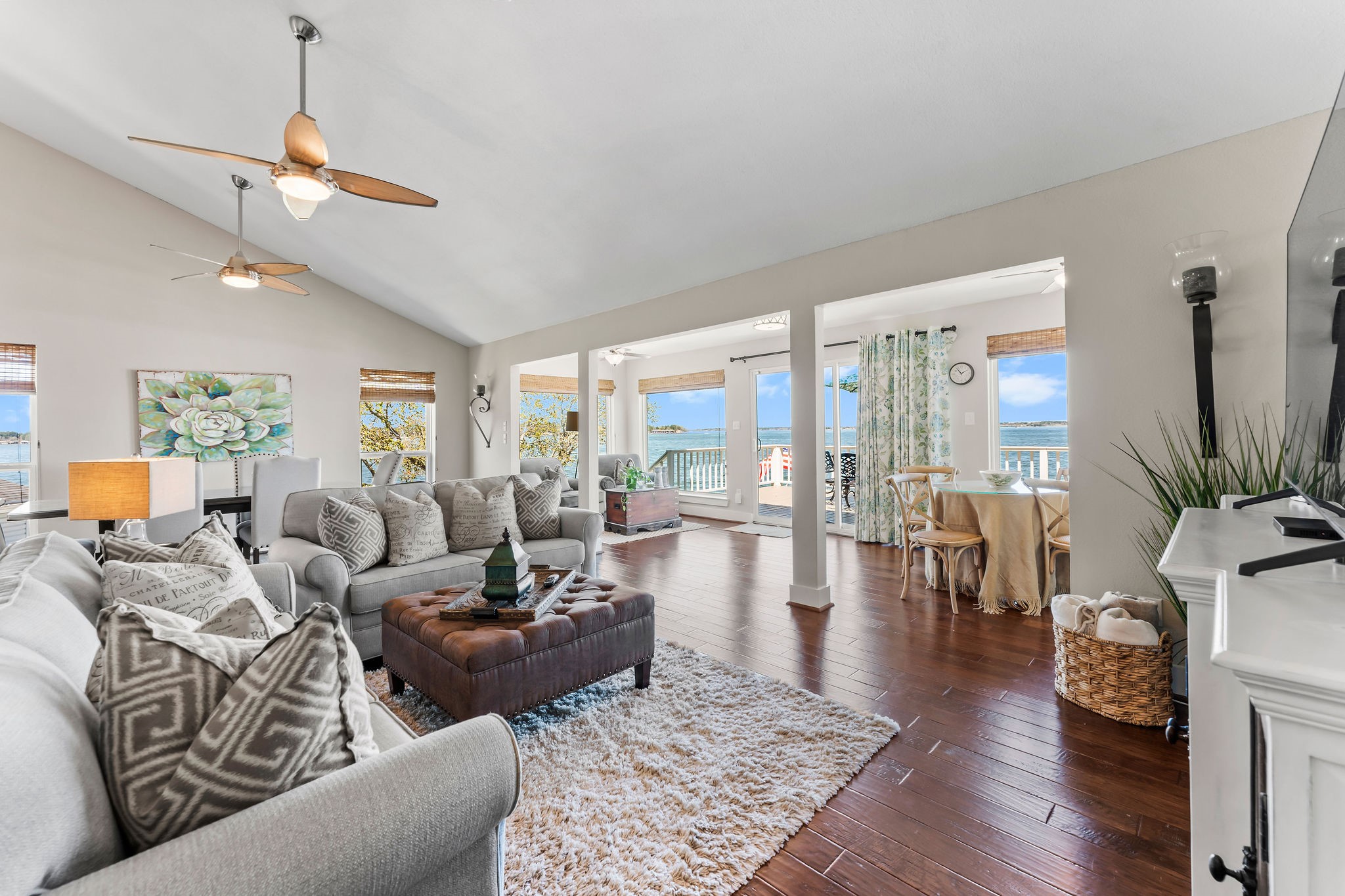 69 Lakeview Village Conroe, TX 77356 - Photo 6 of 50 a living room with furniture and a large window