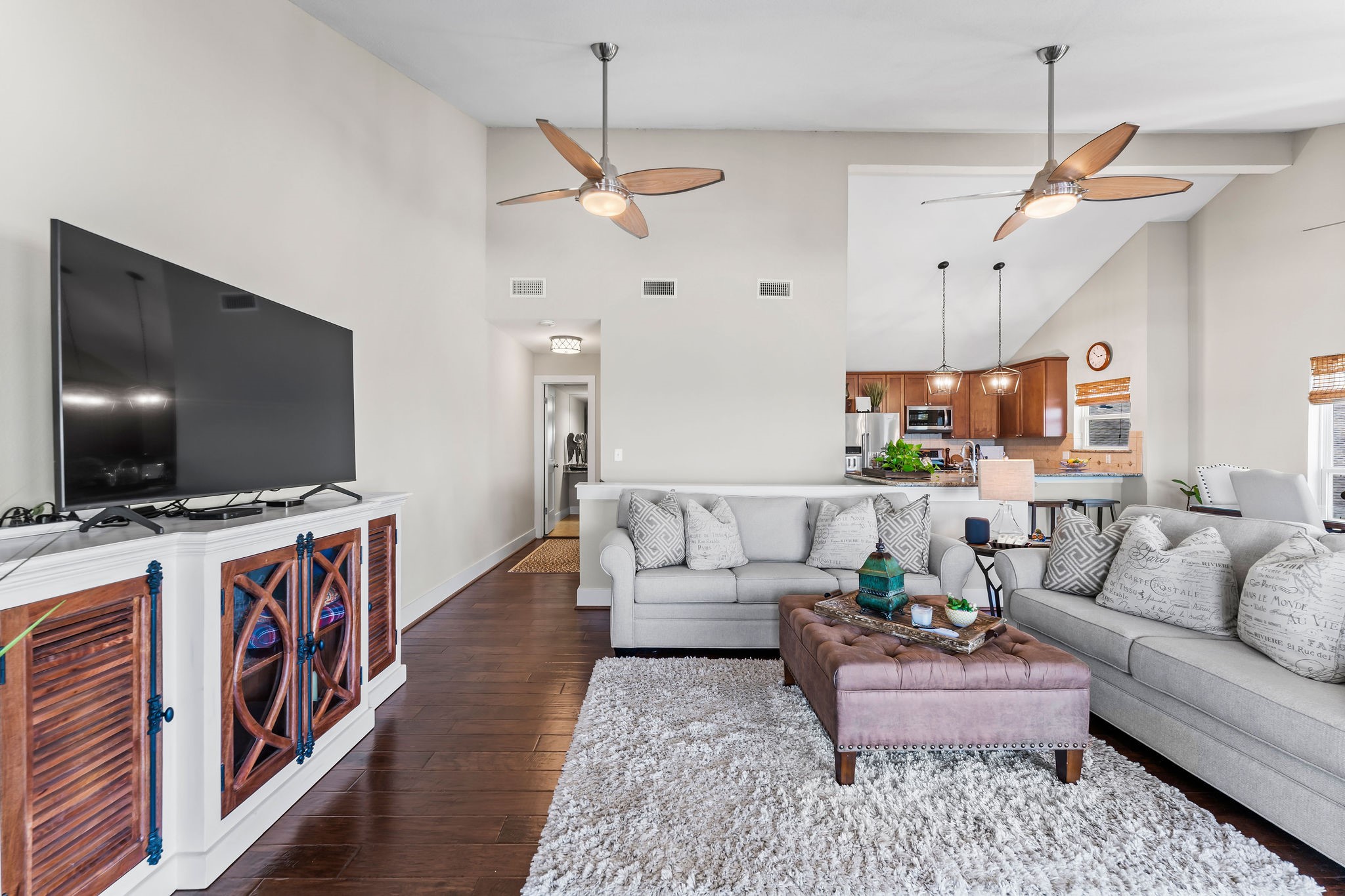 69 Lakeview Village Conroe, TX 77356 - Photo 9 of 50 a living room with furniture and a flat screen tv