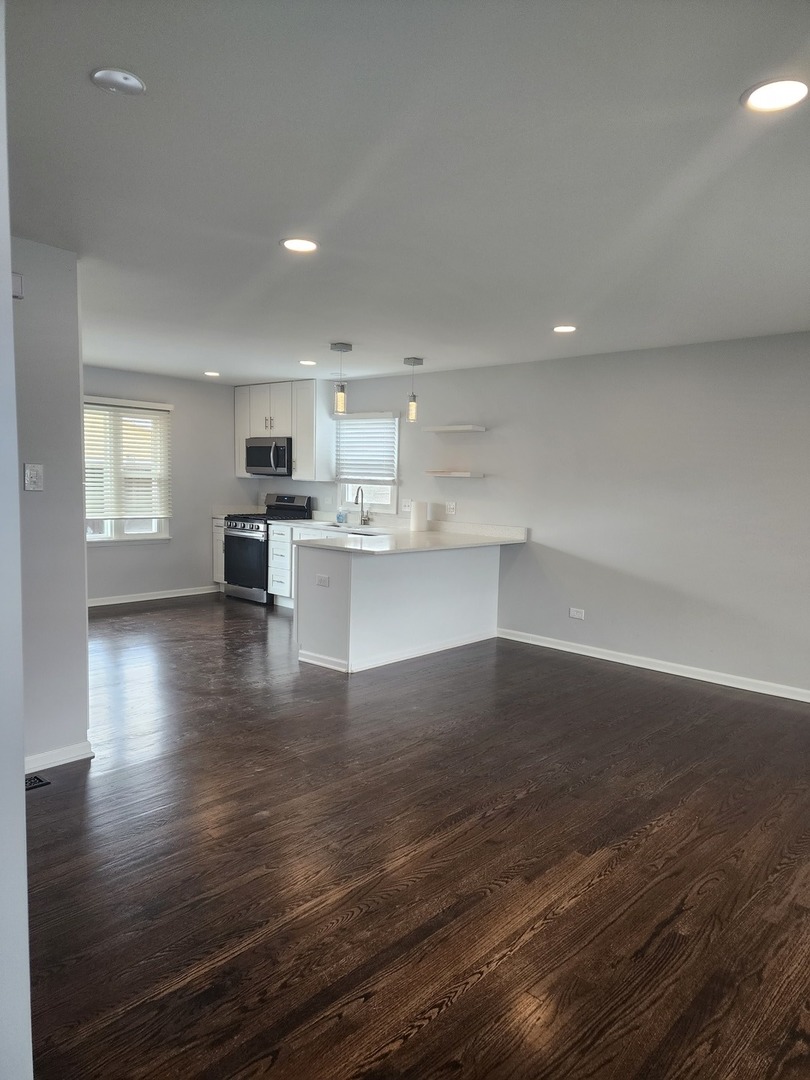 45 Arrowhead Drive Thornton, IL 60476 - Photo 4 of 11 a view of kitchen with wooden floor and electronic appliances