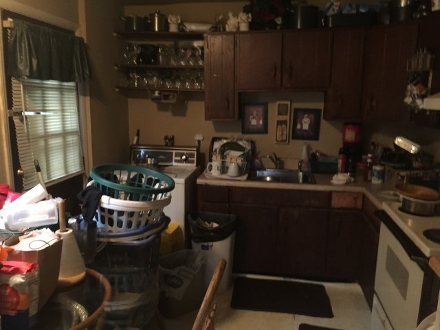 529 Ileagnes Road Raleigh, NC 27603 - Photo 8 of 12 a kitchen with a stove and a refrigerator