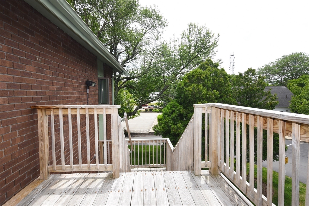 980 Plain Street, Unit 4 Marshfield, MA 02050 - Photo 22 of 26 a view of a wooden fence
