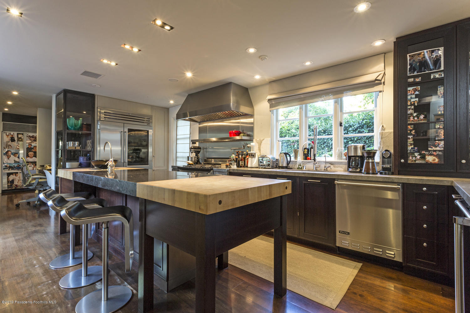 1130 Virginia Road San Marino, CA 91108 - Photo 13 of 55 a kitchen with a table and chairs in it