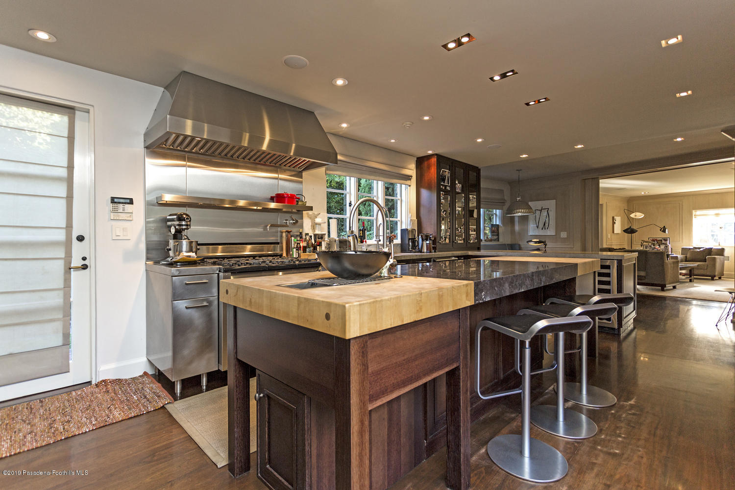1130 Virginia Road San Marino, CA 91108 - Photo 14 of 55 a kitchen with stainless steel appliances granite countertop a stove and a refrigerator
