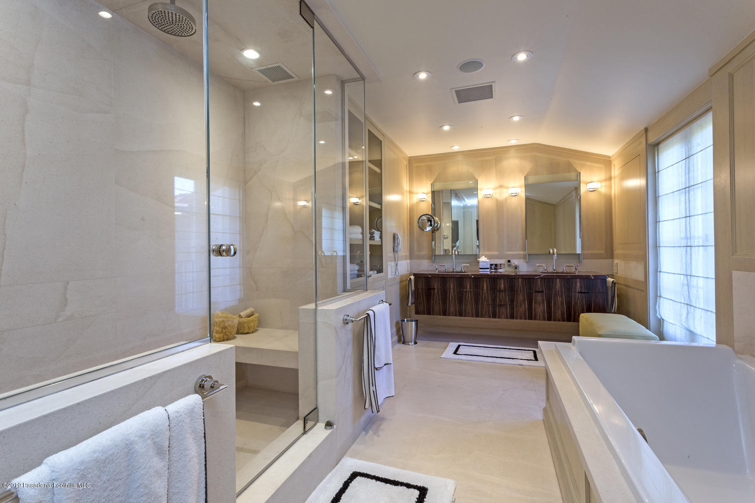1130 Virginia Road San Marino, CA 91108 - Photo 20 of 55 a bathroom with a tub a sink a mirror and a shower