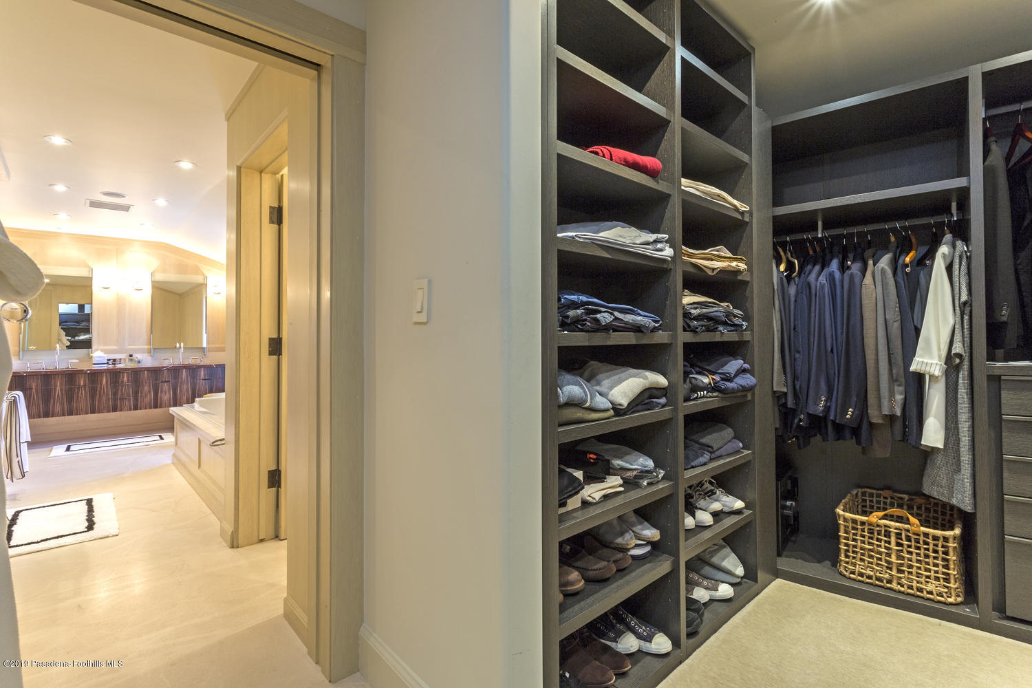 1130 Virginia Road San Marino, CA 91108 - Photo 21 of 55 a view of walk in closet with clothes and shoes