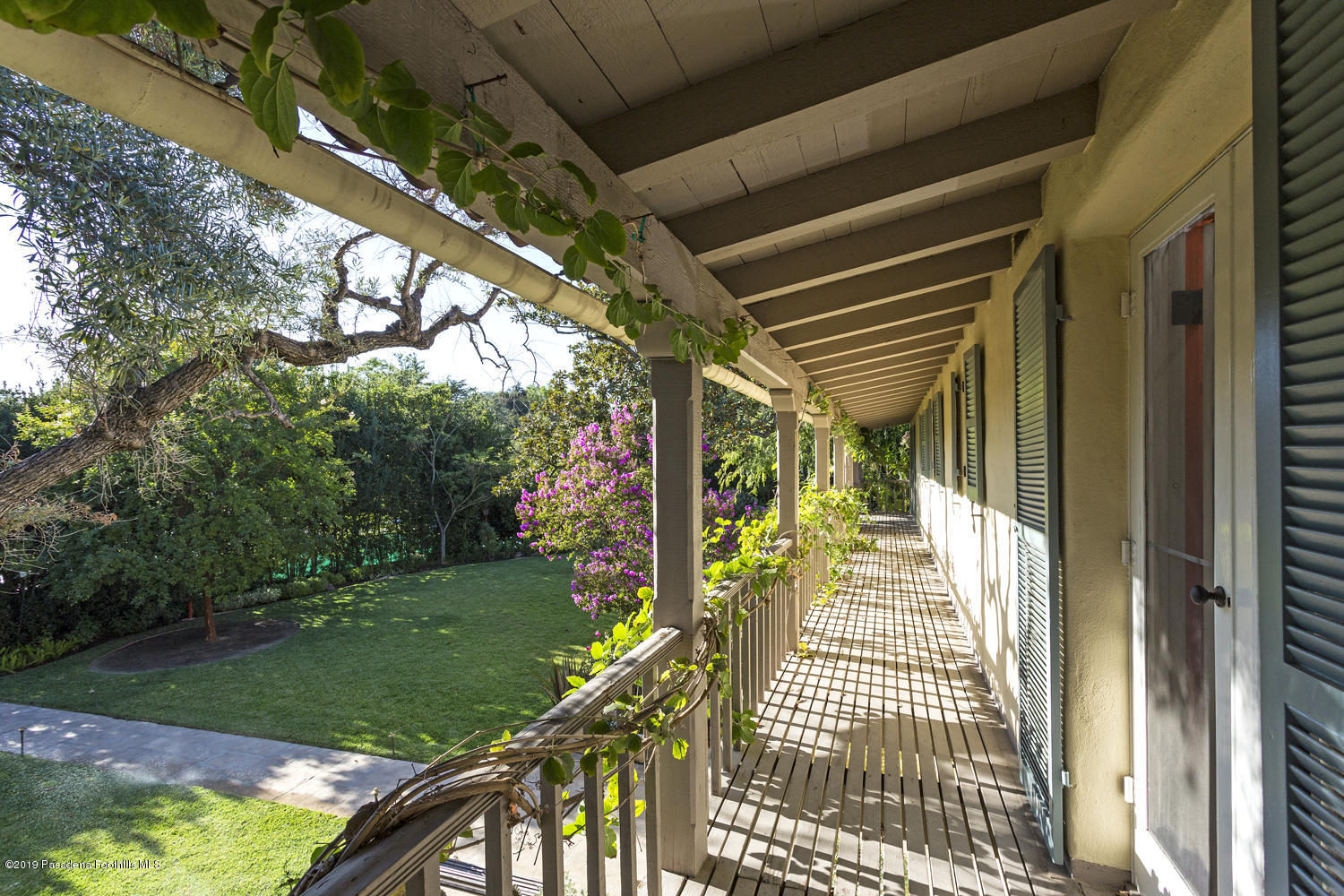 1130 Virginia Road San Marino, CA 91108 - Photo 22 of 55 a view of a porch with a yard