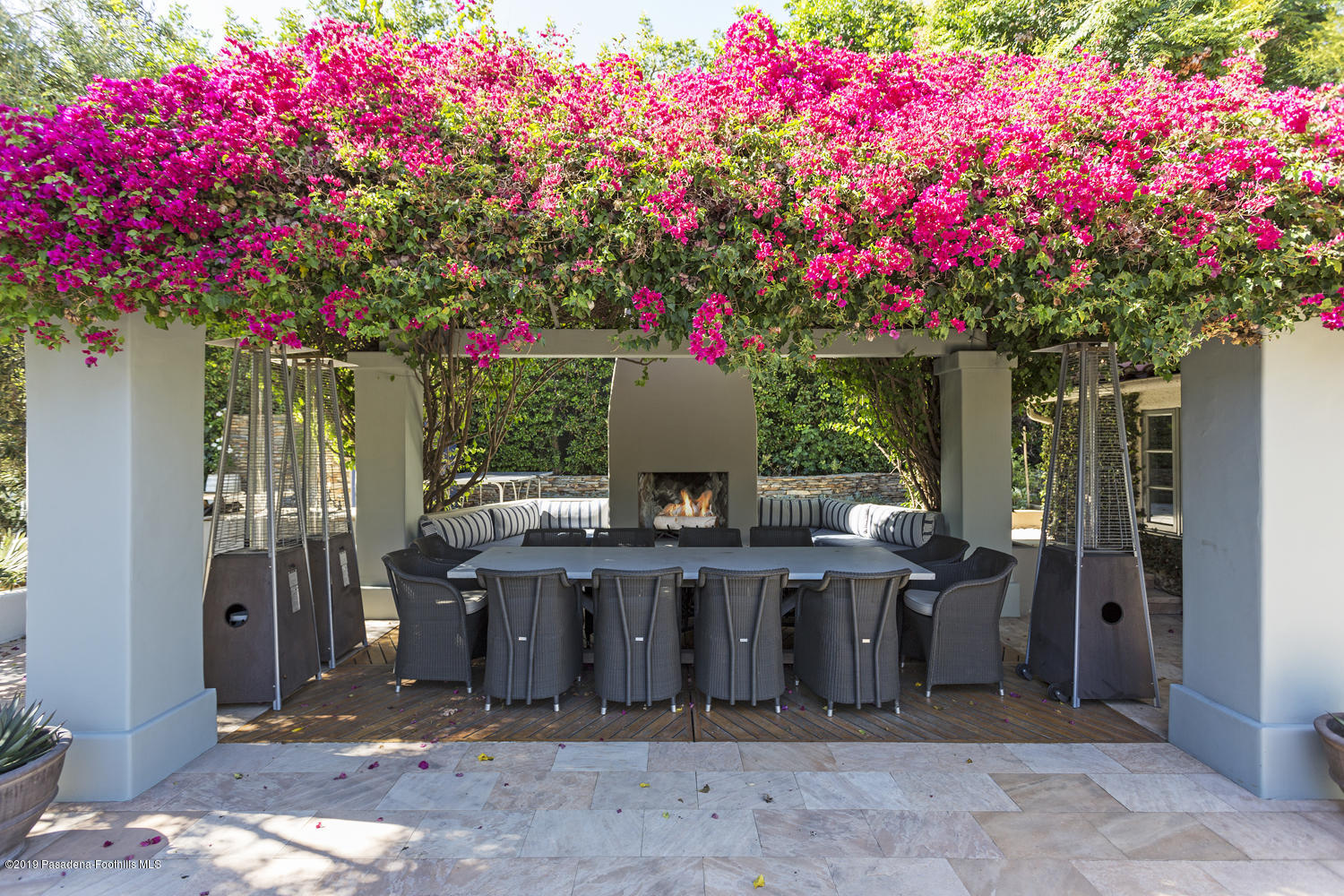 1130 Virginia Road San Marino, CA 91108 - Photo 32 of 55 a view of a patio with table and chairs and potted plants