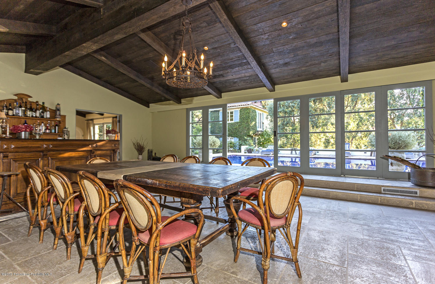 1130 Virginia Road San Marino, CA 91108 - Photo 42 of 55 a dining room with furniture a chandelier and a rug
