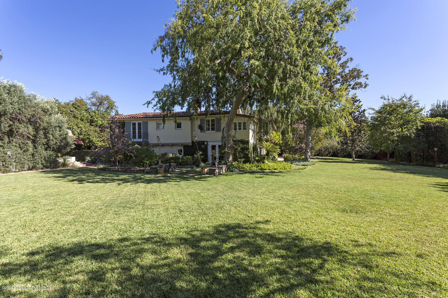 1130 Virginia Road San Marino, CA 91108 - Photo 49 of 55 a view of a house with a yard