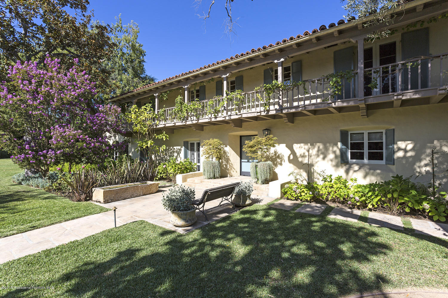 1130 Virginia Road San Marino, CA 91108 - Photo 52 of 55 a front view of a house with swimming pool