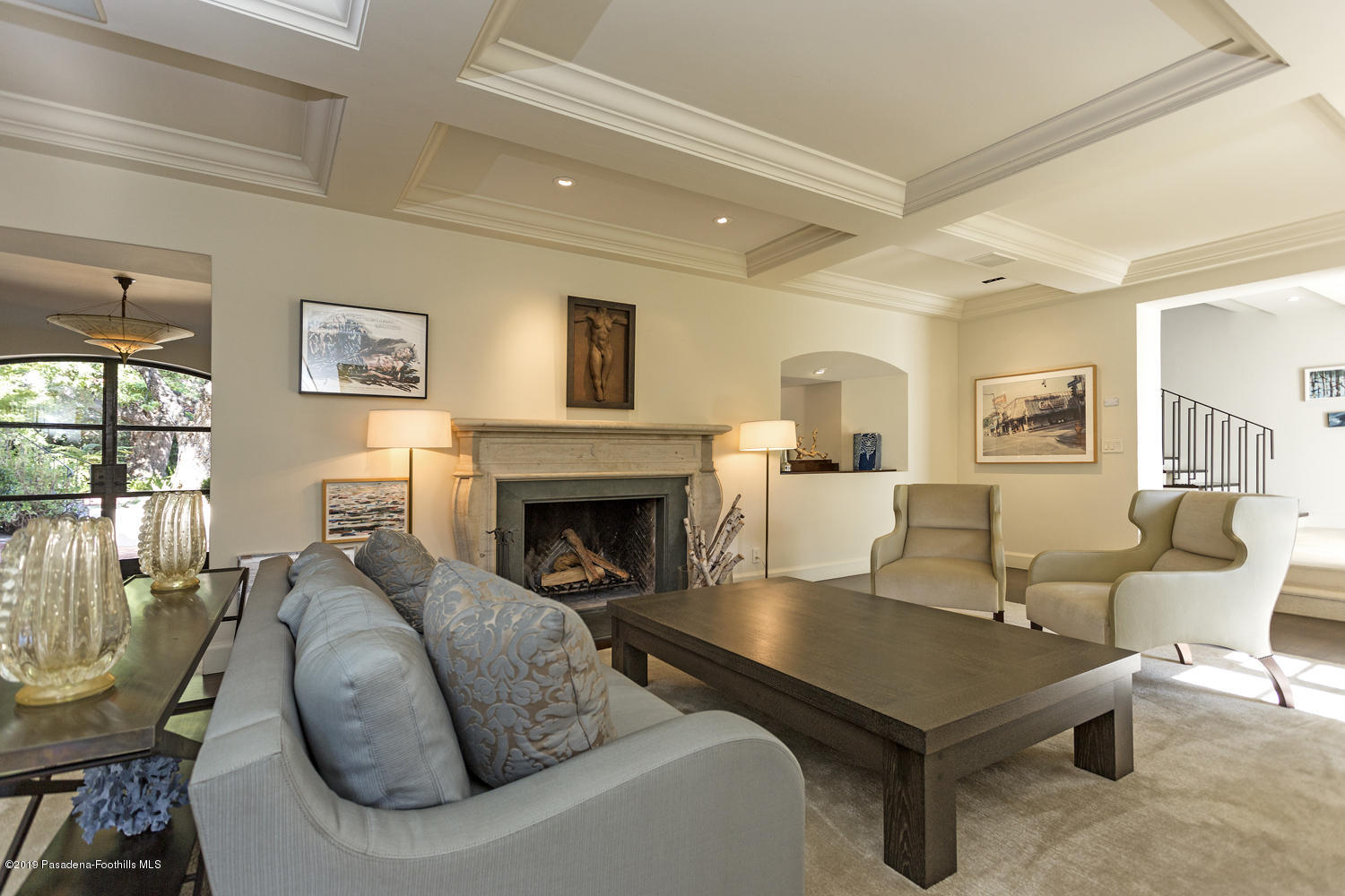 1130 Virginia Road San Marino, CA 91108 - Photo 7 of 55 a living room with furniture a table and a fireplace
