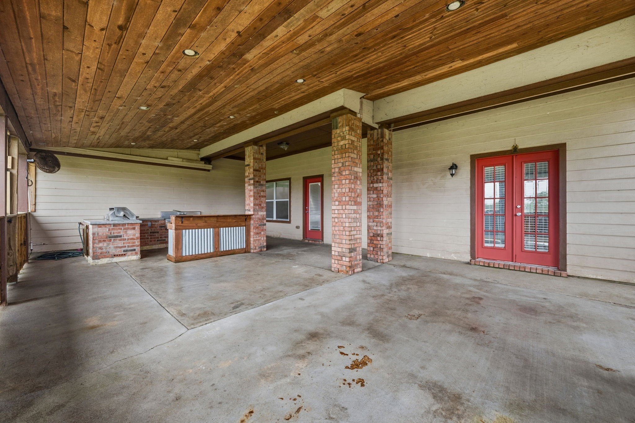 1405 Big Hill Road Winnie, TX 77665 - Photo 37 of 43 a view of empty room with windows