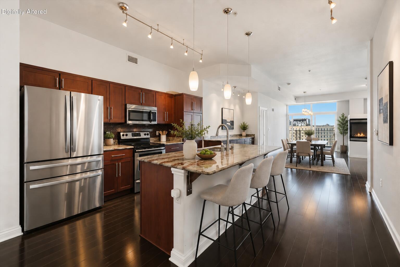 106 West Seeboth Street, Unit 920 Milwaukee, WI 53204 - Photo 3 of 51 Open Concept- Stainless Steel appliances with granite counters, kitchen island and buffet bar, Great for entertaining