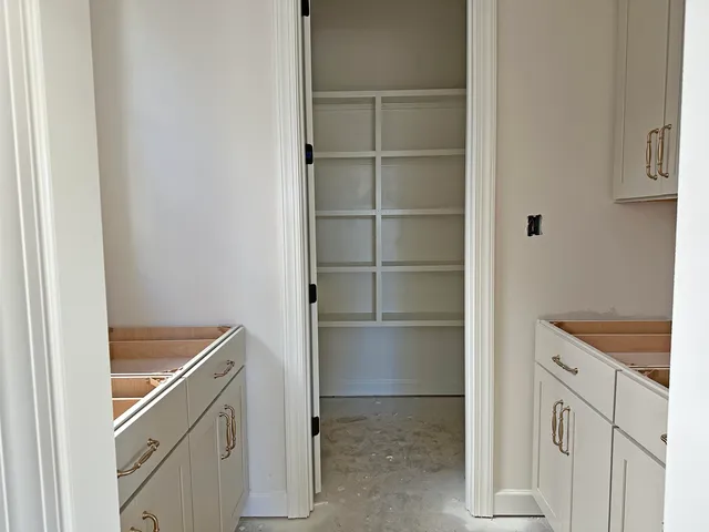 a room with storage and utility