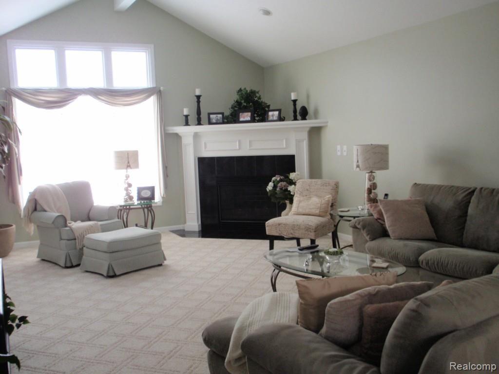 47976 Sandy Ridge Drive Macomb, MI 48044 - Photo 8 of 36 Great Room View 1Catherdral Ceilings, Fireplace and Mantel