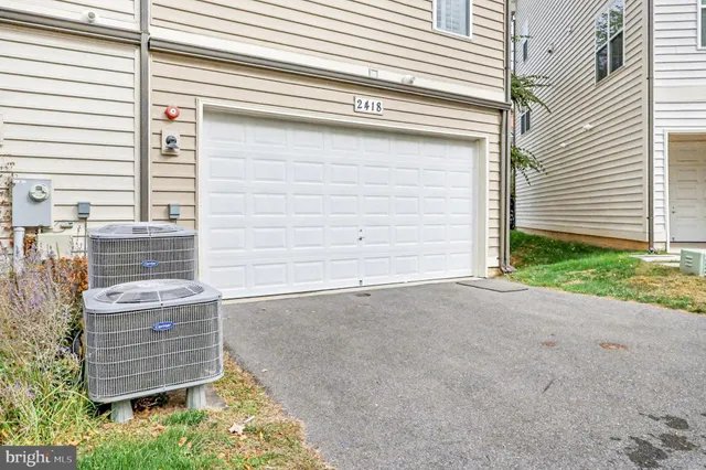 a view of a building with a yard