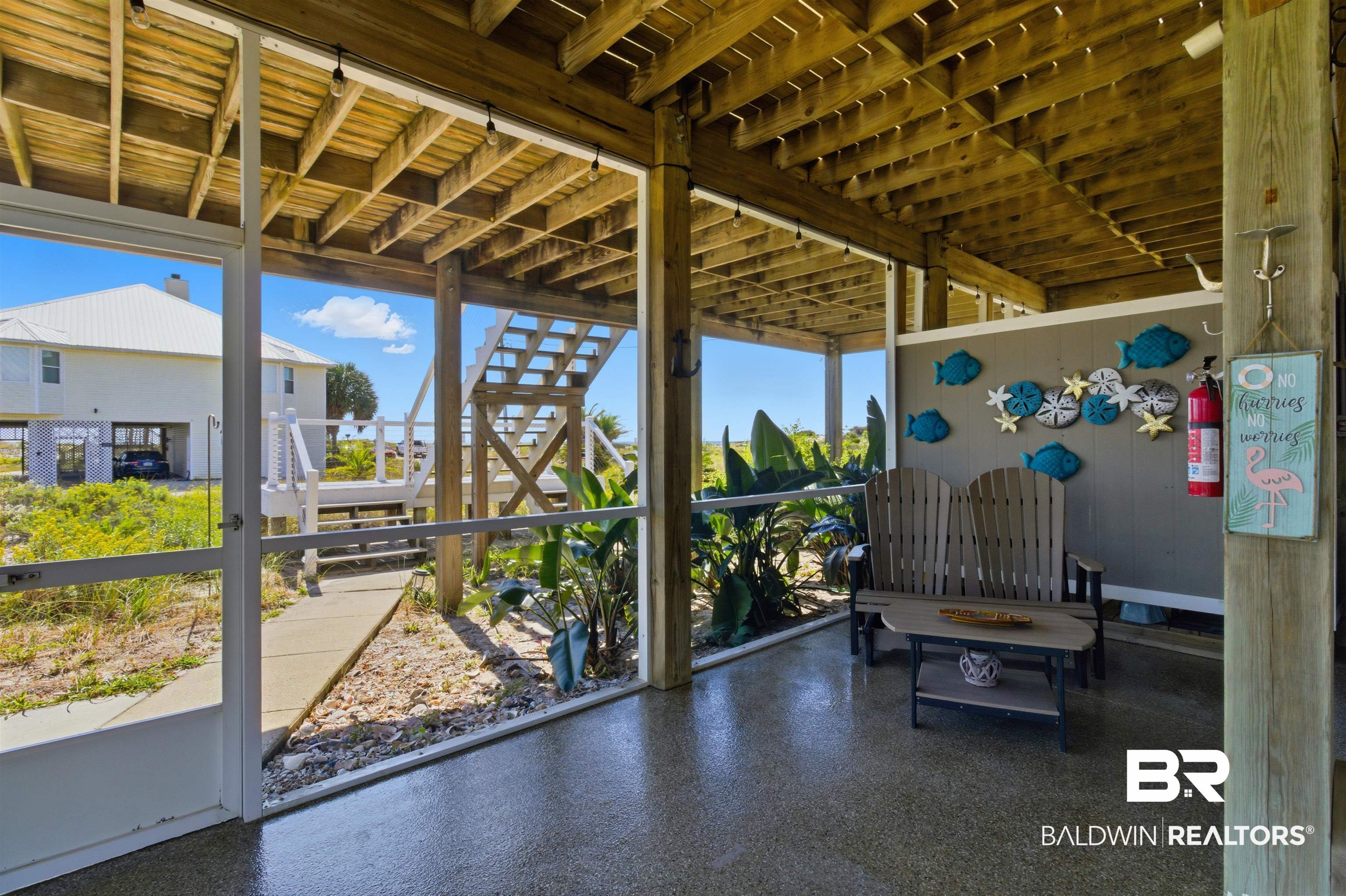 418 Veterans Road Gulf Shores, AL 36542 - Photo 16 of 51 Sunroom / solarium with plenty of natural light