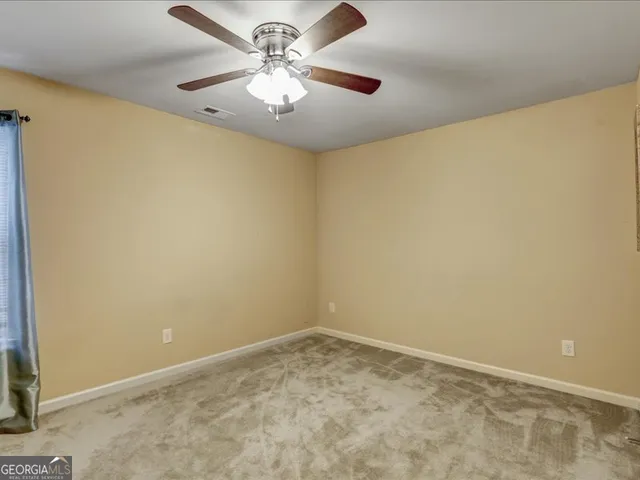 a outdoor living space with chairs