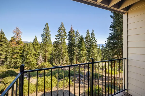 a view of a balcony with an outdoor space